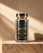 Cell Naturals Liposomal NAD+ 800mg with trans-resveratrol bottle on a travertine ledge in natural light